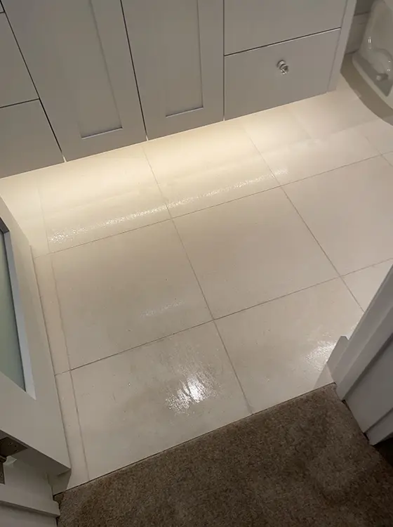 Bathroom tile floor after cleaning, clean and glossy